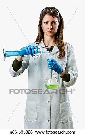 Chemist with beakers View Large Photo Image Stock Photo - Chemist with beakers. Fotosearch