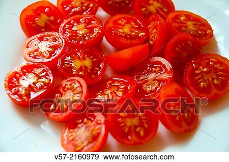 Cherry tomatoes on a dish. Close view. View Large Photo Image Stock Photo - Cherry tomatoes on a dish. Close view.. Fotosearch
