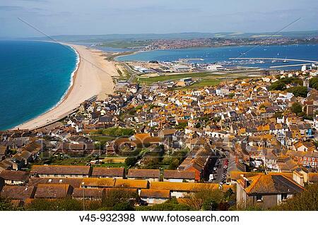 Chesil beach. Fleet lagoon and Portland harbour looking north from Portland Heights. Dorset. England. UK. View Large Photo Image Stock Photo - Chesil beach. Fleet lagoon and Portland harbour looking north from Portland Heights. Dorset. England. UK.. Fotosearch