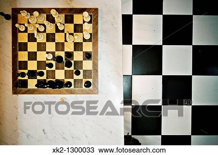 Chessboard and checkered floor inside a bar. View Large Photo Image Stock Image - Chessboard and checkered floor inside a bar.. Fotosearch