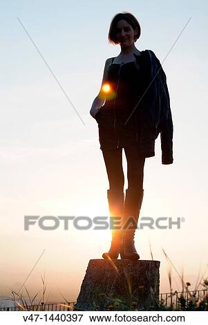 chica al atardecer View Large Photo Image Stock Photo - chica al atardecer. Fotosearch
