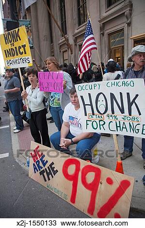Chicago, Illinois -? Occupy Chicago? members protest economic inequality in Chicago's financial district They are part of the? Occupy Wall Street? movement that started in New York View Large Photo Image Stock Image - Chicago, Illinois -? Occupy Chicago? members protest economic inequality in Chicago's financial district They are part of the? Occupy Wall Street? movement that started in New York. Fotosearch