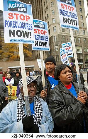 Picture - Chicago, Illinois - Unions, religious groups, and community organizations rally outside the conference of the American Bankers Association, demanding that the big banks and Wall Street firms stop lobbying against financial reform. Fotosearch