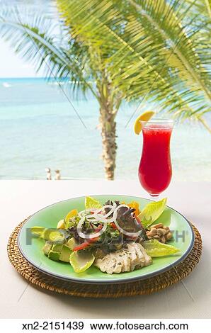Chicken salad and cranberry juice cocktail served al fresco at the beach in Honolulu, Hawaii, United States View Large Photo Image Stock Photo - Chicken salad and cranberry juice cocktail served al fresco at the beach in Honolulu, Hawaii, United States. Fotosearch