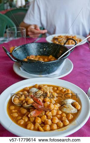 Picture - Chickpeas with seafood. Asturias, Spain.. Fotosearch