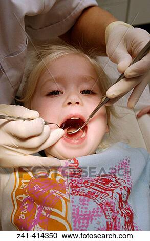 Child at dentist View Large Photo Image Stock Image - Child at dentist. Fotosearch