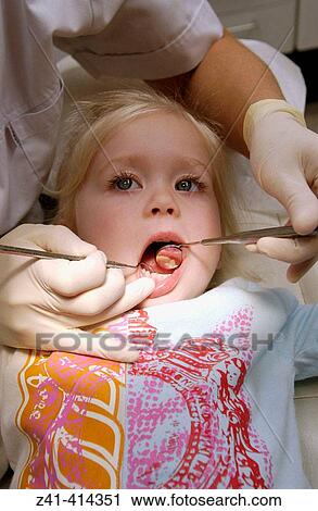 Child at dentist View Large Photo Image Stock Image - Child at dentist. Fotosearch