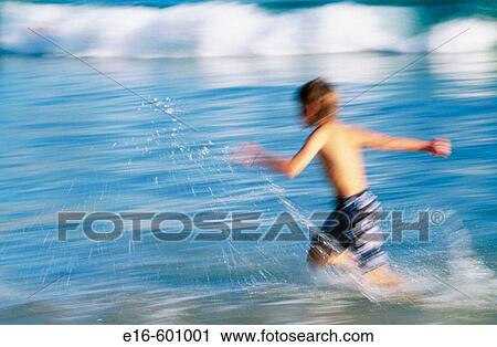 Child at the beach View Large Photo Image Stock Image - Child at the beach. Fotosearch