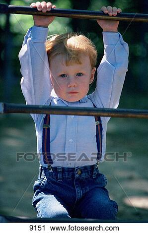 Child climbing View Large Photo Image Stock Image - Child climbing. Fotosearch