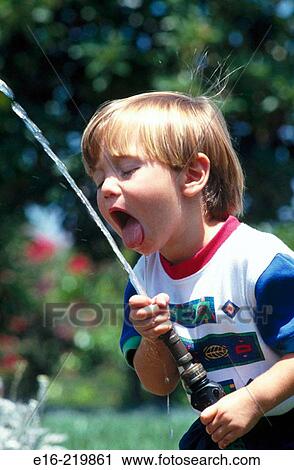 child drinking from hose View Large Photo Image Stock Image - child drinking from hose. Fotosearch