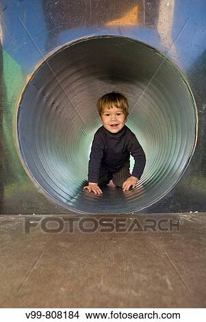 child in a tunnel, View Large Photo Image Picture - child in a tunnel,. Fotosearch