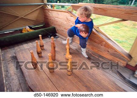 Child in bowling alley View Large Photo Image Stock Image - Child in bowling alley. Fotosearch
