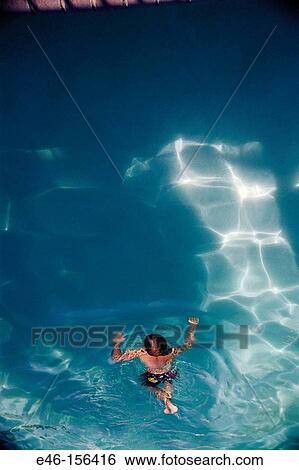 Child in swimming pool View Large Photo Image Stock Photograph - Child in swimming pool. Fotosearch