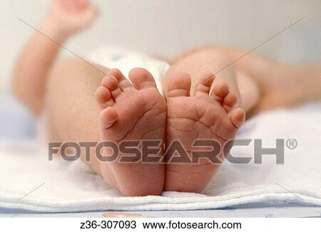 Child infant's feet View Large Photo Image Stock Image - Child infant's feet. Fotosearch