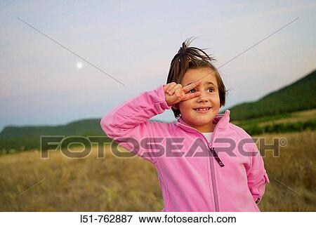 Child joking at sunset, Talayuelas, Cuenca, Castilla la Mancha, Spain, Europe View Large Photo Image Stock Photo - Child joking at sunset, Talayuelas, Cuenca, Castilla la Mancha, Spain, Europe. Fotosearch