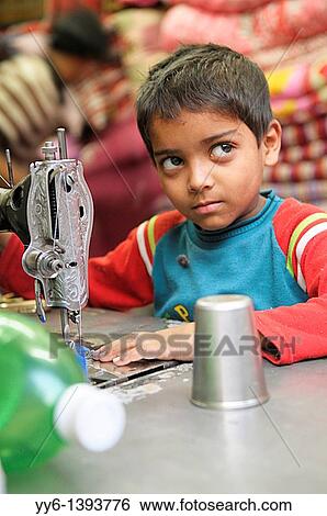 child labourer, young boy sewing, the nepalis, life in kathmandu, kathmandu street life, nepal View Large Photo Image Stock Photograph - child labourer, young boy sewing, the nepalis, life in kathmandu, kathmandu street life, nepal. Fotosearch