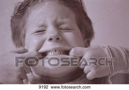 Child making face View Large Photo Image Stock Image - Child making face. Fotosearch