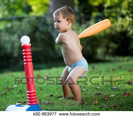 Child playing baseball View Large Photo Image Stock Photo - Child playing baseball. Fotosearch