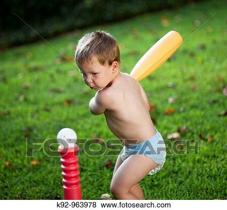 Stock Photo - Child playing baseball.. Fotosearch