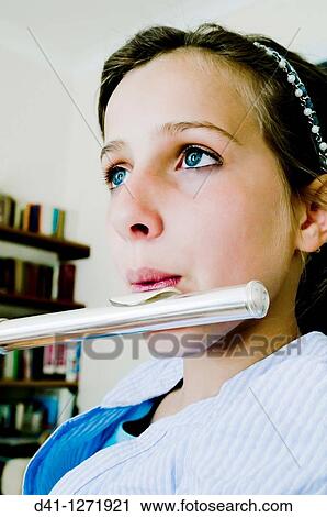 Child playing flute View Large Photo Image Stock Image - Child playing flute. Fotosearch