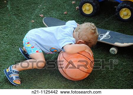 Stock Image - Child playing. Fotosearch
