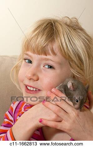 child playing with hamster, england, uk, europe View Large Photo Image Stock Image - child playing with hamster, england, uk, europe. Fotosearch