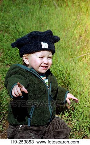 Child pointing happily View Large Photo Image Stock Image - Child pointing happily. Fotosearch