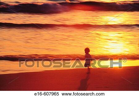 Child running on beach View Large Photo Image Stock Photography - Child running on beach. Fotosearch