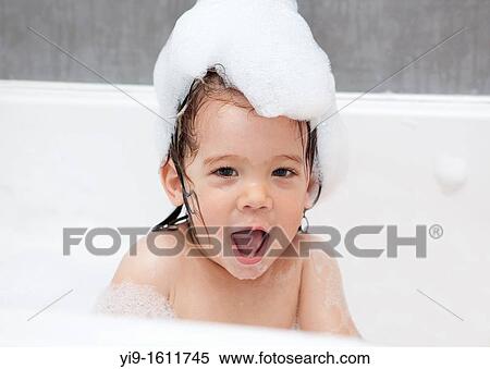 child taking a bubble bath View Large Photo Image Stock Photography - child taking a bubble bath. Fotosearch