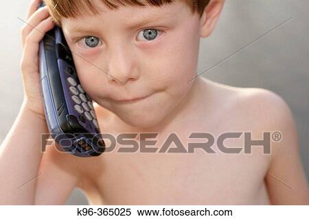 Child using cellular phone View Large Photo Image Stock Photography - Child using cellular phone. Fotosearch