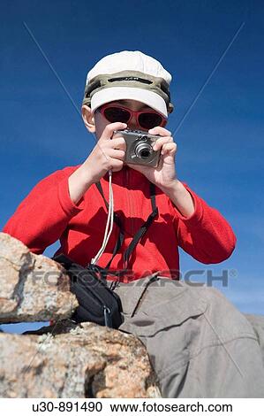 child walker taking pictures in the Sierra de Barco Sierra de Gredos Regional Park Aravalle Valley Barco de Avila Avila Castilla y Leon Spain View Large Photo Image Stock Image - child walker taking pictures in the Sierra de Barco Sierra de Gredos Regional Park Aravalle Valley Barco de Avila Avila Castilla y Leon Spain. Fotosearch