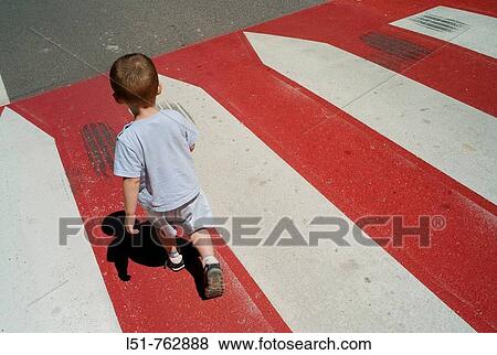 Child walking along a road, Ludiente, Castell? n, Comunidad Valenciana, Spain, Europe View Large Photo Image Stock Photo - Child walking along a road, Ludiente, Castell? n, Comunidad Valenciana, Spain, Europe. Fotosearch