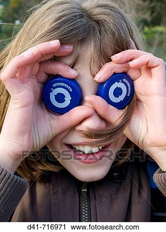 child with bottle top eyes 2008 View Large Photo Image Stock Image - child with bottle top eyes 2008. Fotosearch