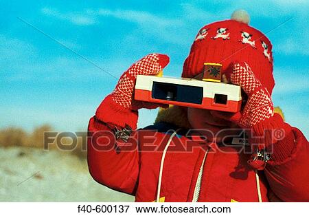 Child with camera View Large Photo Image Stock Photo - Child with camera. Fotosearch