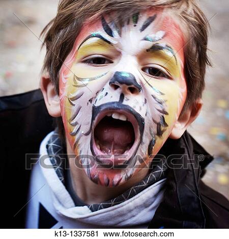 Child with lion painted face View Large Photo Image Stock Image - Child with lion painted face. Fotosearch