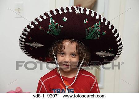 Stock Image - Child with Mexican hat. Fotosearch