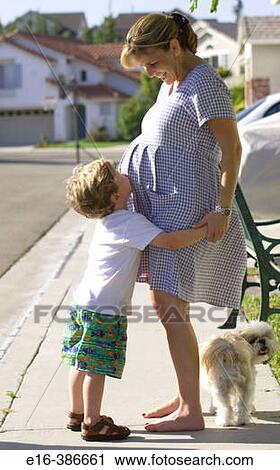 Child with pregnant mother View Large Photo Image Stock Image - Child with pregnant mother. Fotosearch