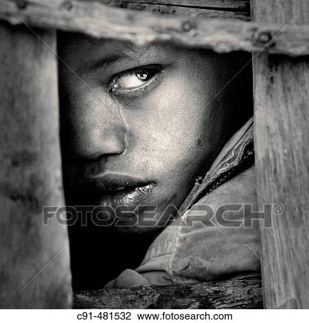 Child with sad look. Tanzania View Large Photo Image Stock Image - Child with sad look. Tanzania. Fotosearch