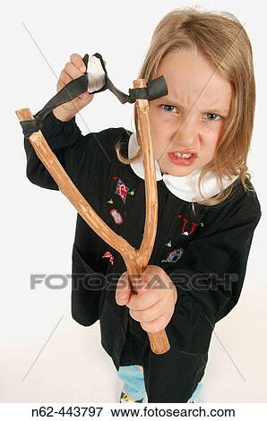 Stock Photo - Child with slingshot.. Fotosearch
