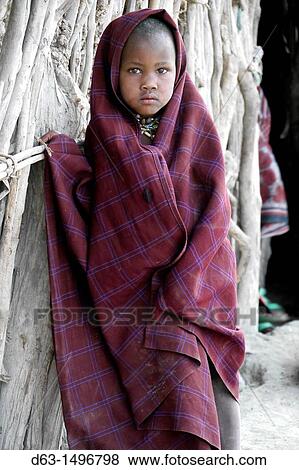 Child wrapped in blanket, Watatulu tribesmen of Miyuguyu, Shinyanga district, Tanzania View Large Photo Image Stock Photo - Child wrapped in blanket, Watatulu tribesmen of Miyuguyu, Shinyanga district, Tanzania. Fotosearch