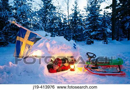 Children, 9 and 14, building a snow cave. Stockholm, Sweden View Large Photo Image Stock Photograph - Children, 9 and 14, building a snow cave. Stockholm, Sweden. Fotosearch