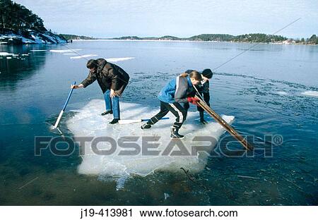 Children, 9 and 14, jumping on ice floes. Stockholm archipelago, Sweden View Large Photo Image Stock Image - Children, 9 and 14, jumping on ice floes. Stockholm archipelago, Sweden. Fotosearch