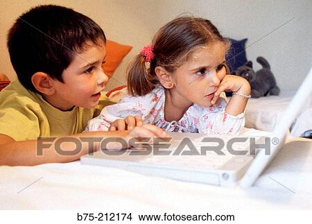 Children and laptop computer View Large Photo Image Picture - Children and laptop computer. Fotosearch