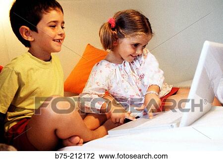 Children and laptop computer View Large Photo Image Stock Image - Children and laptop computer. Fotosearch