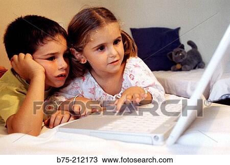 Children and laptop computer View Large Photo Image Stock Image - Children and laptop computer. Fotosearch
