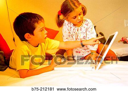 Children and laptop computer View Large Photo Image Stock Image - Children and laptop computer. Fotosearch