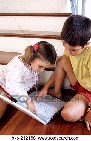 Children and laptop computer View Large Photo Image Stock Photo - Children and laptop computer. Fotosearch