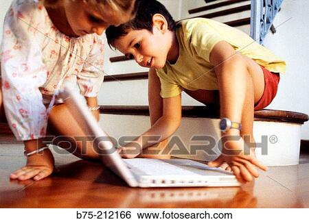 Children and laptop computer View Large Photo Image Stock Photograph - Children and laptop computer. Fotosearch