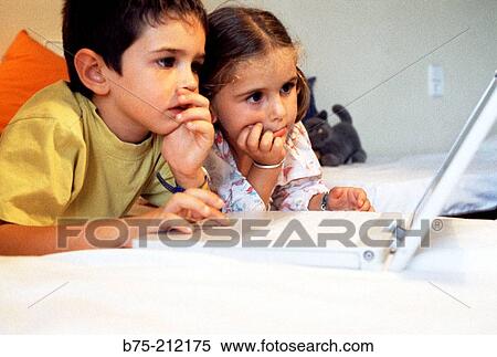 Children and laptop computer View Large Photo Image Stock Photography - Children and laptop computer. Fotosearch