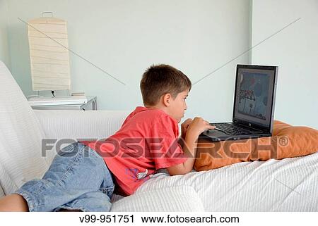 children and video games on laptop View Large Photo Image Stock Image - children and video games on laptop. Fotosearch